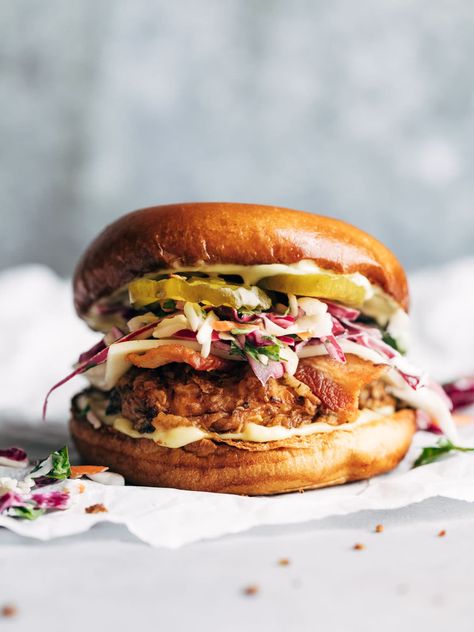 All my friends raved about these fried chicken sandwiches! This recipe for fried chicken is surprisingly easy and SO GOOD. Just soak, dredge, and fry! #friedchicken #chickensandwich #chicken #friedchickensandwich | pinchofyum.com Tangy Slaw, Resep Burger, Fried Chicken Sandwiches, Resep Sandwich, Breakfast Shake, Classic Burger, Dessert Breakfast, Tea Food, Chicken Sandwich Recipes