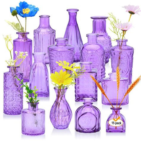 PRICES MAY VARY. Versatile Floral Displays:These 15 glass bud vases suitbale for showcasing a wide range of floral arrangements,from single stems to lush bouquets,these small vases are ideal for creating eye-catching floral arrangements and centerpieces,enhancing any space with natural beauty. Durable Glass Construction-These vases are made of high-quality glass materials with a solid and sturdy construction that is both beauty and durability,and can withstand the weight of floral arrangements w Purple Floral Arrangements Centerpieces, Mason Jar Floral Centerpieces, Lilac And Sage Wedding Centerpieces, Lilac Boho Wedding, Tangled Centerpiece Ideas, Purple Centerpiece Wedding, Lilac Centerpieces, Centerpieces Wedding Candle, Wedding Candle Holder