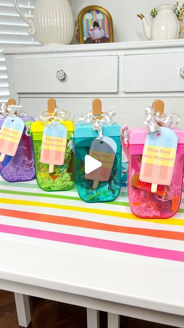 Bianca | I picked up these adorable popsicle canteens from Dollar Tree and wanted to share a cute way to gift them! Fill with candy, croc charms, ... | Instagram Teacher Gifts To Students End Of Year, Teacher End Of The Year Gift Ideas, Diy Gifts For Teachers End Of The Year, Summer School Teacher Gift Ideas, Summer Goodie Bags For Students, Teacher Gift Bags Ideas, Last Day Of School Gifts For Kids, End Of The School Year Gifts For Kids, End Of Year Gifts For Teachers