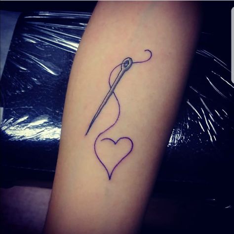 Needle and Heart Thread Tattoo Needle And Thread Tattoo Design, Sewing Heart Tattoo, Sewing Tattoo Ideas Grandma, Needle And Thread Tattoo Simple, Sewing Tattoo Grandma, Quilt Tattoo Ideas, Sewing Needle Tattoo, Grandparent Tattoos, Needle And Thread Tattoo