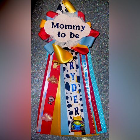 This Is Only For One Mum. This Is A Baby Shower Mum In The Theme Toy Story. Charms Will Be Different But Toy Story Theme Or I’m The Theme Your Wanting. Please When Ordering Be Specify. I Need Theme, Name. Otherwise It Will Be Made With No Name. Toy Story Baby Shower Ideas, Baby Shower Mum, Toy Story Baby, Toy Story Theme, No Name, Be Different, Custom Baby, Baby Shower Themes, Baby Boy Shower