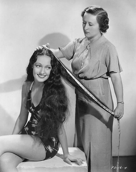 Image Leonore Sabin, head of Paramount’s hairdressing department, measures the tresses of the studio’s new leading lady, Dorothy Lamour. They turn out to be 30 inches long (1936) Joseph Goodheart Long Hair Vintage, Jungle Princess, Dorothy Lamour, Bob Hope, Bing Crosby, Hooray For Hollywood, Classic Movie Stars, September 22, Vintage Hair