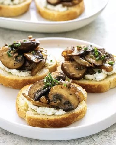 Crostini Mushroom Crostini Recipes, Mushroom Crostini, Caramelized Onions And Mushrooms, Whipped Goat Cheese, Fancy Appetizers, Crostini Recipes, Simply Recipes, Delicious Vegetarian, Caramelized Onions