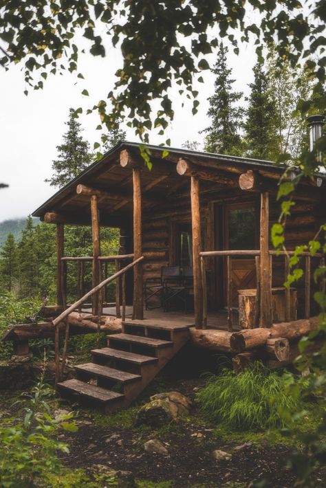 Alaska log cabin in woods with front steps leading to porch. Little Cabin In The Woods, Cabin Aesthetic, Caravan Renovation, Forest Cabin, Cabin Exterior, Cottage Cabin, Wooden Cabins, Cabin Living, Little Cabin