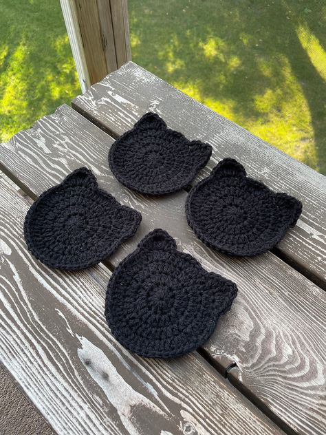 5x5in handmade black cat fall crochet coaster. Pattern by Busy Bee on YouTube :) Only comes with one, others sold separately. Cheap Black Crafts For Gifts, Cheap Handmade Black Crafts, Cheap Crochet Crafts, Fall Crochet Ideas Easy, Crochet Animal Coaster Patterns, Crochet Autumn Free Pattern, Cat Coasters Sewing, Crochet Skull Coasters Free Pattern, Free Crochet Cat Coaster Pattern