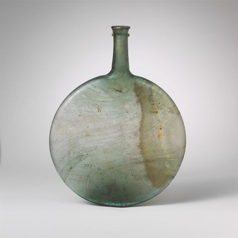 Glass lentoid bottle | Roman | Late Imperial | The Metropolitan Museum of Art Empire Romain, Ancient Roman Glass, Ancient Pottery, Antique Glassware, Antique Bottles, Roman Glass, Greek Art, Ancient Artifacts, Glass Ceramic