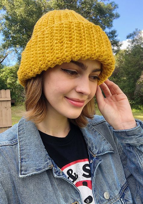 This hand-crochet yellow/mustard ribbed beanie is the perfect unisex beanie that is both fashionable and very cozy! The acrylic yarn is very soft and stretchy, so it will never be too tight and easily fits over glasses. I am also now offering a small and large size! For reference in the pictures, my head is about 21 inches around. Beanie in pictures is a Large Small: 10.5in tall (26cm), 8in wide (20cm), 3oz (85g) Large: 11.5in tall (29cm), 10in wide (25.5cm), 3.5oz (90g) - Handmade from 100% acr Mustard Yellow Beanie Outfit, Yellow Hat Outfit, Crochet Ribbed Beanie, Minions Halloween, Crochet Yellow, Minion Halloween, Yellow Beanie, Beanie Outfit, Hat Outfit