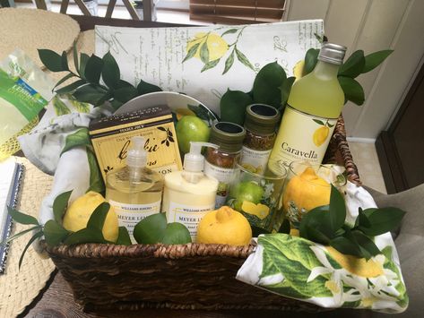 Bridal Shower Gift Basket • Lemon theme • Williams Sonoma Meyer Lemon Apron • Williams Sonoma Meyer Lemon Soap and Lotion • Limencello • Placemats • Trader Joe’s Cookies • Limoncello Basket, Lemon Themed Gift Basket Ideas, Italy Themed Gift Basket, Lemon Theme Gift Basket, Lemon Gift Basket Ideas, Bridal Shower Kitchen Theme, Lemon Gifts, Bridal Shower Gift Basket, Client Gift Baskets