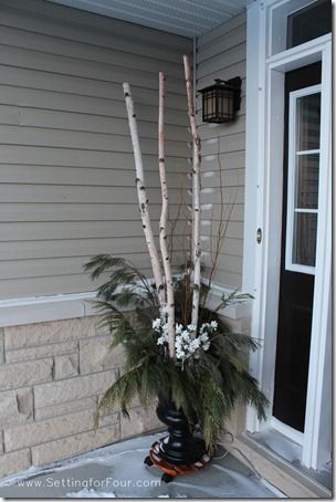 Decorate the outside of your home for winter with DIY urns filled with fresh pine, curly willow and artificial berries and pine poles. See mine on my front porch! Birch Tree Decor Christmas, Decorating With Nature, Birch Tree Decor, Outdoor Christmas Planters, Christmas Urns, Nature Christmas, Holiday Planter, Winter Door Decorations, Winter Wreath Diy