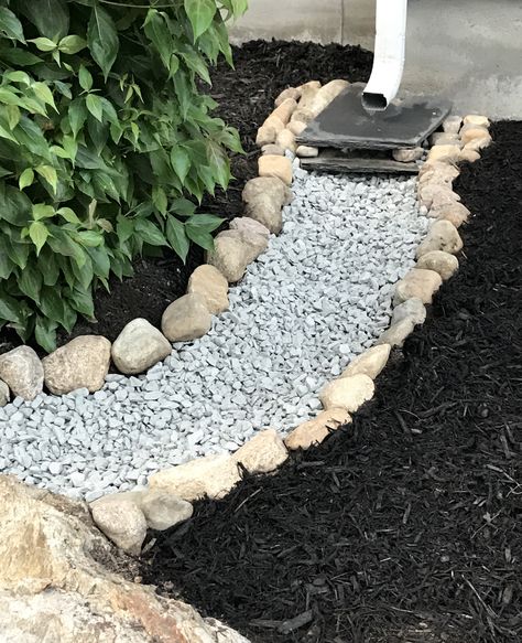 Replace Flower Bed With Rocks, Slate Garden Edging, Landscaping With Slate Pieces, Basement Window Flower Bed, Rock French Drain, River Rock Downspout Drainage, Rock Downspout Drainage, Gutter Drainage Ideas River Rocks, Rock Drainage Path