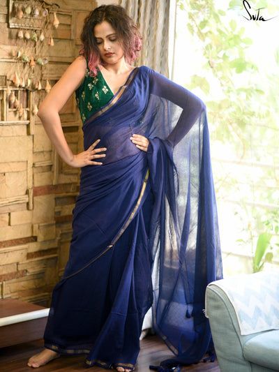 Check out our designer sarees collection, you see styles that would befit your work, festivals, and casual wear, you can pick a saree from your cupboard without thinking twice.. Plain Cotton Saree, Navy Blue Saree, Plain Saree, Butterfly Blouse, Blue Saree, Saree Shopping, Cotton Sarees, Green Blouse, Saree Blouse Designs