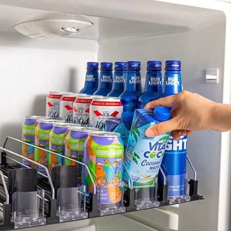 This adjustable can organizer is amazing for tidying up your fridge.  It can widen to fit multiple different can sizes. Easy to assemble without any screws or tools! Prevents the need to reach into the back of the fridge. #organization#affiliate Refrigerator Bottle Organizer, Drink Refrigerator Organization, Drink Organization Fridge, Beverage Fridge Organization, Drink Fridge Organization, Soda Organizer, Drink Organizer, Water Bottle Organization, Drink Fridge