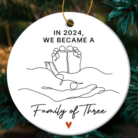 PRICES MAY VARY. Baby's First Christmas Ornament 2024 - Celebrate the joyous milestone of becoming a family of three in 2024 with a heartfelt Christmas ornament. This special keepsake, featuring the quote "In 2024 We Became A Family Of Three," captures the love and excitement of this unforgettable year, making it a perfect gift to cherish forever Family Of 3 Christmas Ornament - Gift this beautiful ornament to new parents or loved ones to commemorate their growing family. It's a touching reminde Christmas Baby Gifts, Parents Gifts, First Time Dad Gifts, Christmas Baby Announcement, Baby First Christmas, Christmas Gifts For Parents, Dad To Be, First Time Mom, Gifts For Couples