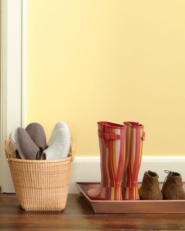 Slipper Station  Stop grimy shoes in their tracks by setting a boot tray next to the front door. But go the extra mile for guests by offering everyone a pair of slippers. Shoe Tray, Shoe Station, Creating An Entryway, Metal Storage Bins, Elegant Entryway, Mudroom Organization, Boot Tray, Wood Table Legs, Entryway Console