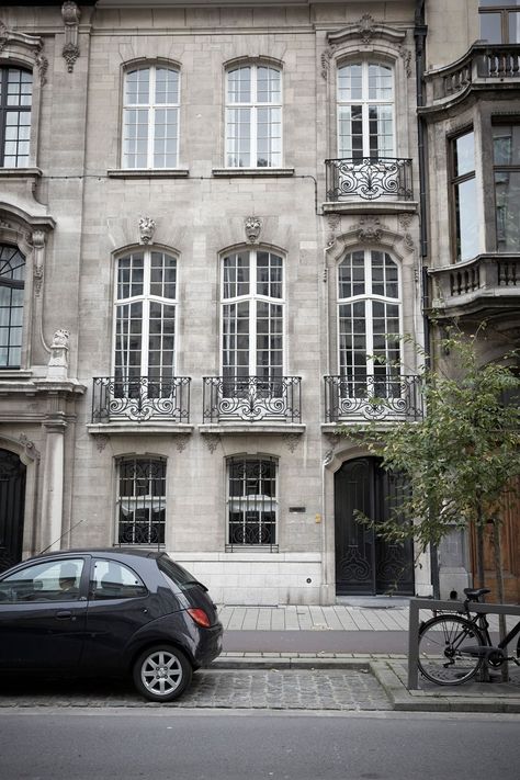 Explore this stunning Belgian townhouse - a lesson in decorating with white | Livingetc Decorating With White, Bathroom Cladding, Townhouse Interior, Minimal Furniture, Iron Balcony, Townhouse Designs, European Architecture, Vernacular Architecture, Classic Architecture