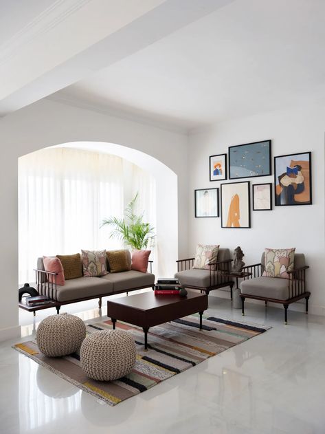 This Hyderabad home marries French-style architecture with vernacular interiors | Architectural Digest India Indian Living Room Design, Folk House, Sofa Design Ideas, Indian Room Decor, Indian Living Room, Minimalist Living Room Design, Indian Living Rooms, India Home Decor, Indian Home Interior