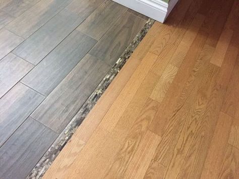 …transitioning wood to tile Carpet To Tile Transition, Tile To Wood Transition, Floor Transition, Wood Look Tile Floor, Hardwood Tile Floor, Transition Flooring, Wood Floor Bathroom, Slate Flooring, Linoleum Flooring