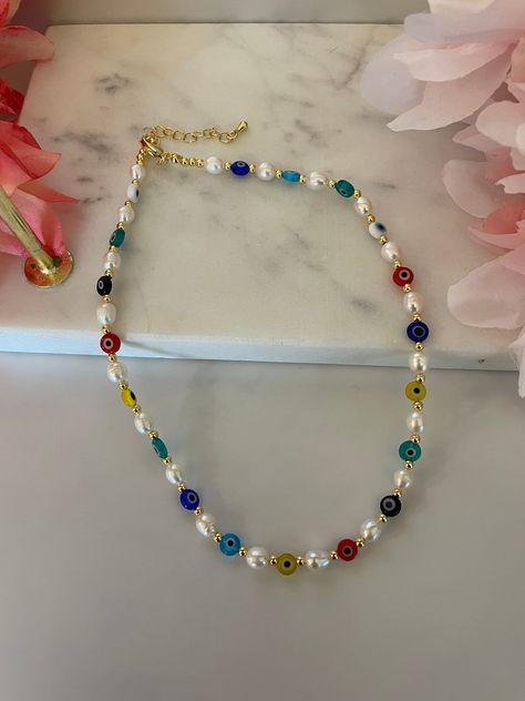 JEWELRY MAKING #BeadedJewelry Evil Eye Bead Bracelet, Homemade Necklace Ideas, Evil Eye Jewelry Diy, Evil Eye Necklace Beaded, Evil Eye Beaded Necklace, Making Beaded Jewelry, Eyes Necklace, Homemade Necklaces, Funky Necklace