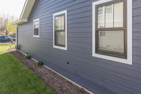 James Hardie Plank Siding in Deep Ocean with Black Andersen 100 Series Windows! Installed by Opal Enterprises! Navy Vinyl Siding House, Blue House With Black Windows, Blue House Exterior White Trim, Blue House Black Windows, Navy Blue House Exterior White Trim, House Exterior White Trim, Houses With Black Windows, Navy Blue House Exterior, Blue House White Trim