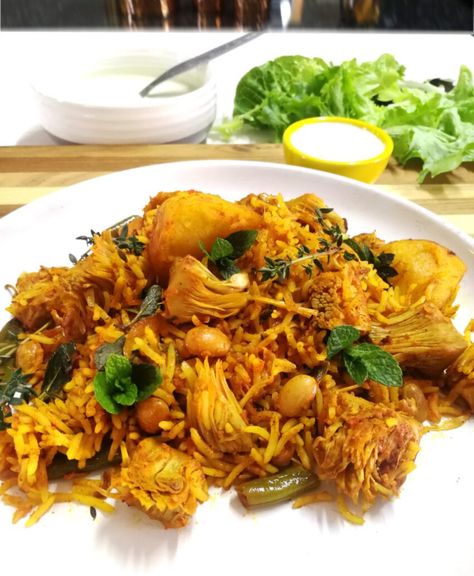 Jackfruit Biryani Jackfruit Biryani, Raw Jackfruit, Fresh Green Beans, Fresh Mint Leaves, Crushed Garlic, Fried Onions, Fennel Seeds, Curry Leaves, Fresh Garlic