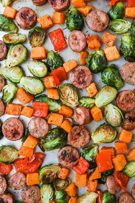 sheet pan sausage and vegetables Sausage Sweet Potato Recipes, Sweet Potato Brussels Sprouts, Sausage And Sweet Potato, Sheet Pan Sausage And Veggies, Pan Sausage And Veggies, Sprouting Sweet Potatoes, Sheet Pan Sausage, Sausage And Veggies, Chicken Sausage Recipes