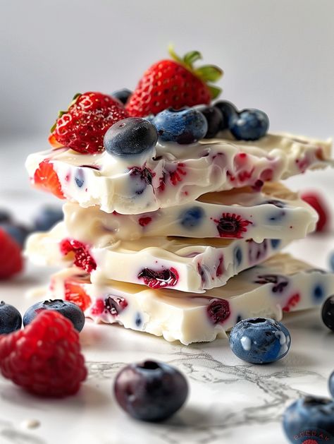 🍨 Frozen Yogurt Bark 🍨 Enjoy a refreshing and light dessert with this Frozen Yogurt Bark, studded with blueberries, strawberries, and raspberries.  Ingredients 👌  2 cups nonfat plain yogurt (or flavored yogurt) 🥄 ¼ cup agave 🍯 ½ teaspoon pure vanilla extract 🍨 ¼ teaspoon fresh lemon juice 🍋 Pinch of salt 🧂 Sliced strawberries 🍓 Blueberries 🫐 Raspberries 🍇 Finely chopped pecans (optional) 🌰 Granola (optional) 🥣 Keto Yogurt Bark, Yogurt Frozen Treats, Yogurt Covered Strawberries, Greek Yogurt Bark, Keto Yogurt, Easy Frozen Yogurt, Flavored Yogurt, Yogurt Bars, Yogurt Bark Recipe