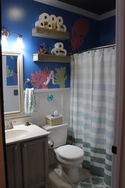 A mom decorates her kids' bathroom. She paints the walls a cobalt blue, but then she does this! Sea Bathroom Ideas, Under The Sea Bathroom Ideas, Kid Bathrooms, Fun Kids Bathroom Ideas, Sea Themed Bathroom, Kids Bathroom Paint, Under The Sea Bathroom, Sea Bathroom Decor, Kids Bathroom Girls