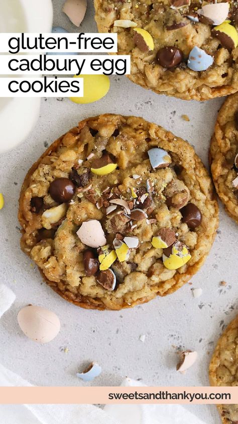 This Gluten-Free Cadbury Egg Cookies recipe is made with a chewy oatmeal cookie base, plenty of chocolate chips & Cadbury mini eggs in every bite! (So, basically, the perfect Easter cookie recipe!) If you need an easy gluten-free Easter dessert to try this year, these cookies are the PERFECT option. Gluten Free Cadbury Egg Cookies, Gluten Free Easter Cookies, Cadbury Egg Cookies, Cadbury Cookies, Cadbury Mini Egg Cookies, Chewy Oatmeal Cookie, Gluten Free Holiday Cookies, Best Gluten Free Cookies, Cadbury Mini Eggs