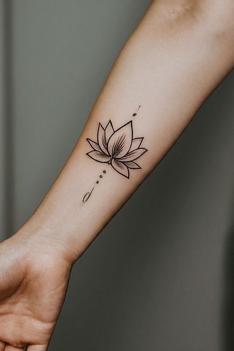 13 Lotus Flower Tattoo Placement Ideas Lotus Flower Tattoo Inner Wrist, Lotus Tattoo On Wrist, Delicate Lotus Tattoo, Lotus Flower Tattoo Placement, Lotus Flower Tattoo On Arm, Lotus Flower Butterfly Tattoo, Lotus Flower Tattoos For Women, Lotus Flower Moon Tattoo, Lotus Symbol Tattoo