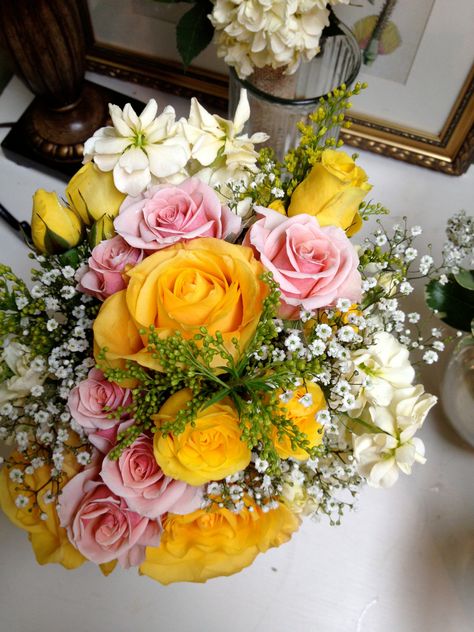 Yellow Roses, Pink Roses, and Baby's Breath by Alta Fleura Yellow And White Prom Bouquet, Pink And Yellow Prom Bouquet, Yellow Prom Flowers Bouquet, Pink And Yellow Roses Arrangement, Yellow And Pink Quinceanera Theme, Pink And Yellow Roses Bouquet, Yellow And Pink Flower Bouquet, Prom Flowers Bouquet Yellow Dress, Yellow Hoco Bouquet