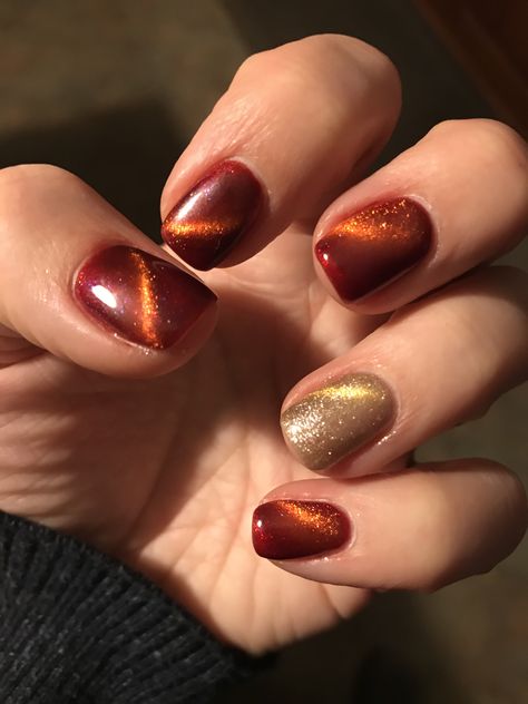 Fall Nail Designs Cat Eye, Orange Cat Eye Nails Design, Burnt Orange Cat Eye Nails, Cat Eye Orange Nails, Thanksgiving Cat Eye Nails, Cat Eye Fall Nail Designs, Cat Eye Fall Nails, Christmas Cat Eye Nails, Fall Cat Eye Nails