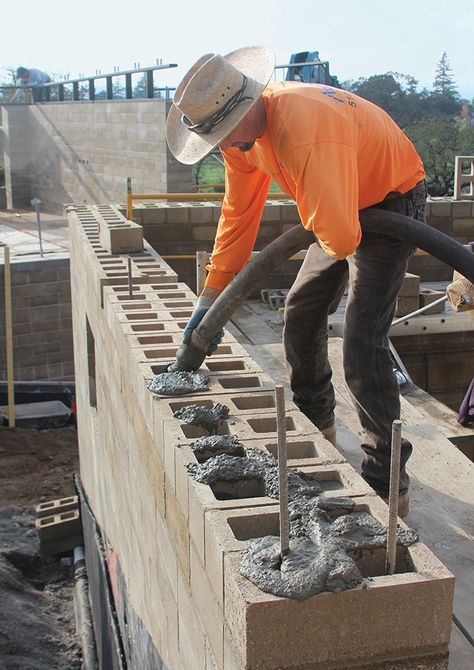 Edward De Reza of Watershed Materials uses a pump to fill blocks with concrete grout, which works with reinforcing steel to shore up the walls of the home. Concrete Block House, Yard Privacy, Rammed Earth Homes, Insulated Concrete Forms, Types Of Bricks, Concrete Block Walls, Cinder Block Walls, Front Yard Landscaping Pictures, Landscaping Florida