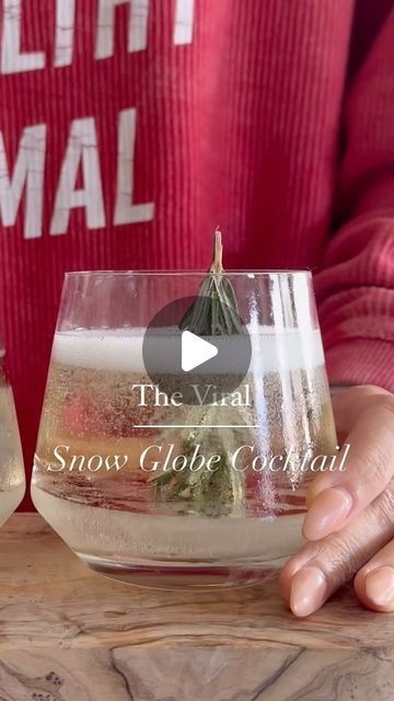 Krista | Healthy Food+Fitness on Instagram: "The 🌟VIRAL SNOWGLOBE COCKTAIL ❄️totally lives up to the hype and is such a fun festive way to serve a cocktail. Here’s how 👉🏼using a freezer safe cup. Fill with 1/3-1/2 cup of water. Cut the top of rosemary sprig to fit in the glass. Put rosemary in water so it’s standing and looks like a tree🎄If it won’t stay in place, just tie a string to the stem and and tape the string to the glass to hold it there. Freeze for 2-4 hours. 🥳➡️Works with sparkling wine, sparkling water or any clear cocktail (gin & tonic or vodka soda)🍸 cheers! #prosecco #prosecco🍾 #snowglobetumbler #snowglobecocktail #vodkacocktail #champagne #cocktails #cocktailrecipes #cocktailtime #craftcocktails #craftdrinks #cocktailgram #holidayrecipes #holidaycocktails #imsomartha Snow Globe Cocktail, Snowglobe Cocktail, Cocktail Gin, Vodka Tonic, Champagne Cocktails, Vodka Soda, Rosemary Sprigs, Cup Of Water, Champagne Cocktail