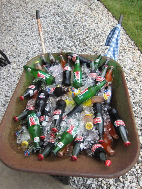 Bottled drinks in wheelbarrow for farm first birthday party Western Housewarming Party, My First Rodeo Birthday Drinks, Bbq Birthday Decorations, Farm Bbq Party, 18th Birthday Bbq Party Ideas, Adult Bbq Birthday Party Ideas, Cowboy Theme Drinks, 18th Bday Party Ideas Boys, Bbq Birthday Party Ideas Kids