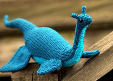 A knitted Nessie Crochet Lockness Monster, Lockness Monster, Knit Monster, Amigurumi Book, Lochness Monster, Knitted Amigurumi, Water Horse, Diy Tricot, Monster Pattern