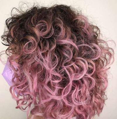 Tricolor Hair Highlights, Pink Hair Highlights Curly, Brown Roots Colored Hair, Peekaboo Hair Color Curly Short, Pink Peekaboo Highlights Curly Hair, Curly Hair With Pink Tips, Underlayer Hair Dye Curly, Dusty Pink Curly Hair, Curly Hair With Colored Tips