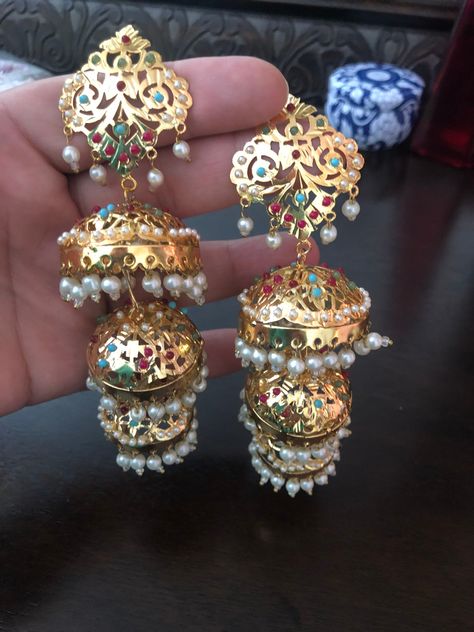 Very stylish Hyderabadi long multi gold plated earrings. Dress up your wedding wear with this navaratan Hyderabadi earrings In stock now and ready to ship. Hand crafted and gold plated kundan indian/pakistani jewelry Material:brass,stone,gemstone,pearl We bring you casual as well as party wear jewelry which comes with an attractive design and style. It goes well modern and traditional outfits. Visit my website for more collections https://www.etsy.com/shop/Noorzaracollection Hyderabadi Earrings, Hyderabadi Jewelry, Braid Accessories, Jewelry Kundan, Jewelry Pakistani, Kundan Jewelry, Wedding Vision, Stones Jewelry, Pakistani Jewelry