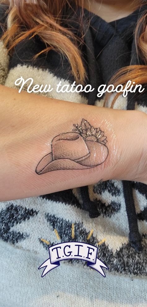 Country Sunflower Tattoo, Cowboy Hat With Angel Wings Tattoo, Upside Down Cowboy Hat Tattoo, Cowboy Hat Memorial Tattoo, Small Cowboy Hat Tattoos For Women, Floral Cowboy Hat Tattoo, Cowgirl Tattoos Western Spine, Country Life Tattoos, Minimalist Western Tattoo Ideas