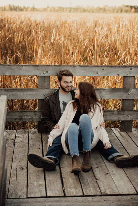 This dreamy fall photoshoot was on the boardwalk at the fink centre. This was dreamy location as well as a stunning couple with matching blundstones. Boardwalk Family Photoshoot, Couples Photoshoot On Dock, Boardwalk Photoshoot, Country Couple Poses, Couple Fall Photoshoot, Couple Photoshoot Ideas, Fall Couples, Des Couples, Fall Engagement Pictures