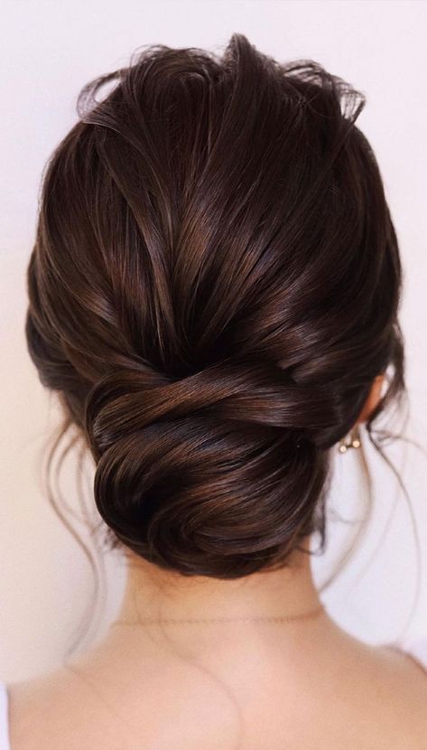 updo medium length, wedding updo hairstyles, bridal hairstyles 2021, medium length updos Messy Low Bun Wedding Dark Hair, Updo Hairstyles For Brunettes, Simple Bridal Updos For Medium Hair, Hair Updos Brunette, Bridal Hair Updo Brown Hair, Bridal Hairstyles Elegant, Bridal Hair Up Brunette, Chic Wedding Updo, Medium Length Brunette Wedding Hair