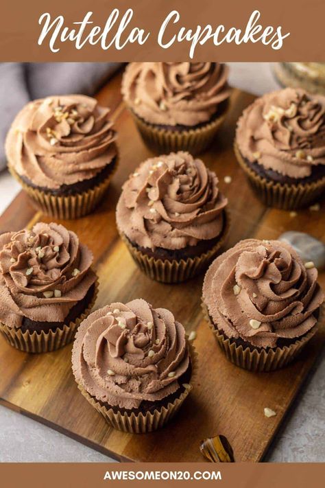 These Nutella Cupcakes have a deep, dark chocolate hazelnut flavor. Moist cupcakes with a tender crumb get topped with a billow of Nutella Buttercream Frosting for a truly delightful treat. #cupcakes #nutella #chocolatecupcakes Nutella Buttercream Frosting, Nutella Cupcakes, Nutella Buttercream, Moist Cupcakes, Nutella Spread, Autumn Recipes, Chocolate Hazelnut Spread, Chocolate Nutella, Awesome Recipes