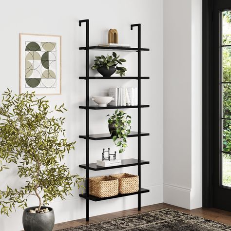 PRICES MAY VARY. This 6-tier tall, modern wall mount bookcase or shelving wall unit for shelving up any space with its industrial and modern style of matte black metal and painted wood. With wider shelves, this tall ladder bookshelf offers substantial storage with open shelves to display decor, collectibles or books. Has a sleek and space-saving style with open shelves you can use for your home office, kitchen or living room. Create the perfect space thanks to the modular design of Theo 6-shelf Bookshelf Wood, Industrial Wall Shelves, Metal Ladder, Tall Bookcase, Wall Mounted Bookshelves, Ladder Bookshelf, Corner Bookshelves, Tall Bookcases, Salon Suites