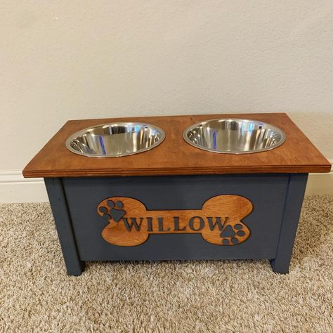 This dog bowl holder is handy and impressive. You might like to try making one yourself this weekend. Have you made a similar project before? 📷 @watts_wood_works . . . #diyproject #woodworking #woodworkingproject #woodworkings #woodworker #wooddesign #wood #woodcarving #woodwork #woodworkcraft #woodworkforall #woodworkingcommunity #woodworkingskills #dowoodworking #woodworkingtips Dog Food Station, Dog Bowl Holder, 4h Projects, Cnc Ideas, Dog Quotes Love, Bowl Holder, Dog Bowl Stand, Wood Craft Projects, Bowl Stand