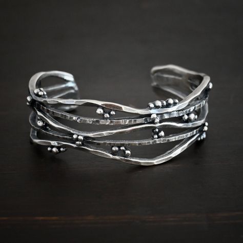 - Sterling Silver - 4mm thick x 17mm wide - Wrist Size: Small 6″, Med, 7″, Large 8″ - Handmade so each cuff will vary slightly - heavy duty to last a lifetime Follow Us: Instagram: https://www.instagram.com/wildprairiesilver/ Facebook: https://www.facebook.com/wildprairiesilver/ Visit our Jewelry Website www.wildprairiesilver.com Handmade Jewelry Supplies www.savannahjewelrysupply.com Contact Us: Call or Text: 920-365-6341 Email: info@wildprairiesilver.com Contact Hours: Monday - Friday (8am-4pm Hammered Bangles, Handmade Silver Jewellery, Metal Cuff Bracelet, Handmade Jewelry Bracelets, Metal Clay Jewelry, Silver Jewelry Design, Jewelry Website, Funky Jewelry, Silver Jewelry Handmade