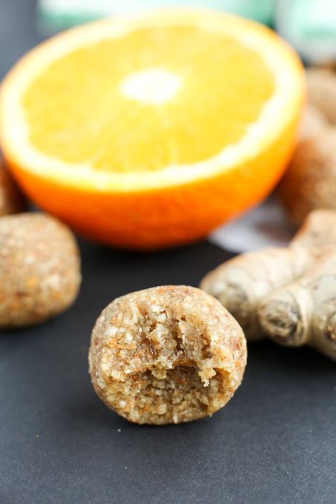 an anti-inflammatory ginger energy ball with a bite taken out of it and a piece of fresh ginger and an orange in the background Jasmine Rice Recipes, Peanut Butter Energy Balls, Anti Inflammation Recipes, Energy Ball Recipe, Eat Pray, Eat Pray Love, Ginger Recipes, Inflammatory Foods, Healthy Snacks Easy