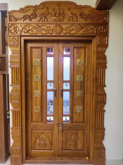 South Indian Pooja room door South Indian Pooja Room, Puja Room Door Design Indian Modern, South Indian Pooja Room Design, Pooja Door Design Modern, Pooja Room Door Design Modern, Pooja Room Double Door Designs, Indian Pooja Room, Mandir Door, Room Arch