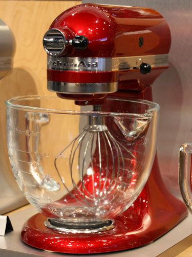 The KitchenAid Tilt-Head Stand Mixer is always a classic, but we especially love it in the new metallic Candy Apple shade. #design #kitchenaid #mixer Red Kitchenaid Mixer, Kitchen Aide, Kitchen Aid Appliances, Stand Mixers, Tilt Head, Pasta Roller, Shade Design, Kitchenaid Artisan, Kitchenaid Mixer