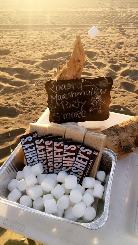 Roast a marshmallow and party s'more! Birthday Beach Bonfire Ideas, Beach Bonfire Decor, Lake Birthday Ideas, Wedding Beach Bonfire, Bonfire Bday Party Ideas, Camping Birthday Party Aesthetic, Bonfire Party Ideas Beach, Beach Day Birthday, Beach Bonfire Birthday Party Ideas