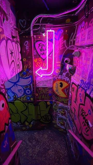 Uncover More on Instagram: "Giveaway / Step back in time to the 1980s ⚡️ With a staircase full of graffiti, an adults-only shop, fiery cocktails, vinyls, and all the neon signs, The Woo Woo (@thewoowoonyc) takes you back in time to the 1980s. But first, you must know the code to enter! ⚡️ A nod to the city’s grunge-punk era, ring the doorbell and share the passcode to enter. After going through a winding graffiti staircase, you pass through an adults-only shop. Step through the red curtain and Woo Woo, Instagram Giveaway, Red Curtains, But First, Back In Time, Rocker, Chelsea, Graffiti, Neon Signs