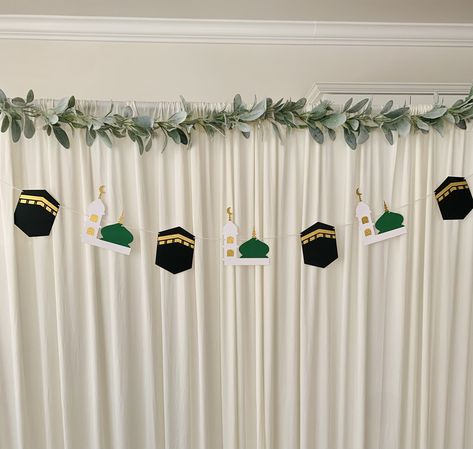 This banner is made with high quality cardstocks.  This banner measures up to  4ft 8in approximately with 4kaaba pennants and 3madina pennants.  This will be a good ad on for Eid decorations, Hajj Mubarak decorations etc. Please also check other products from this shop https://houseofzaam.etsy.com Umrah Mubarak Decorations Ideas, Ramzan Mubarak Decoration, Banner Maulidur Rasul, Rabi Ul Awal Decoration Ideas, Milad Decoration Ideas At Home, Maulid Decoration, Hajj Decorations Ideas, Ramadan Classroom Decorations, Eid Home Decoration Ideas